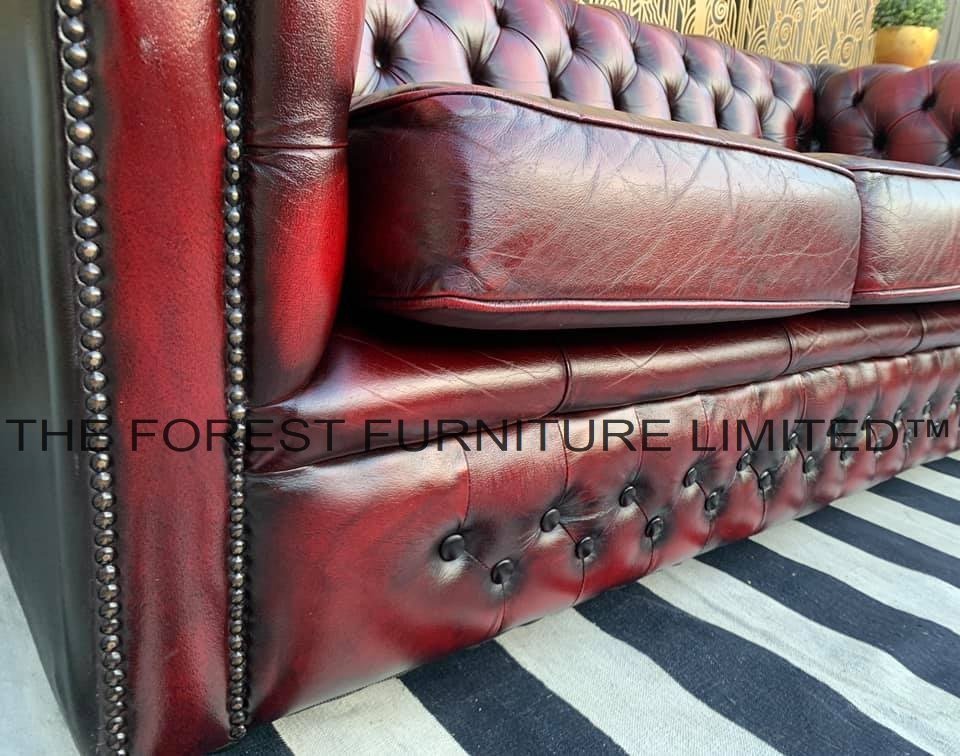 Royal British Chesterfield sofa leather side and stitching detail